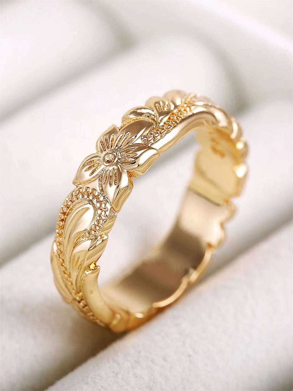 Engraved Flower RingDon’t want to wear a ring that feels ordinary and lacks meaning? This engraved flower ring is here to change that. Thoughtful design with floral engraving, this ringRemoloxEngraved Flower Ring
