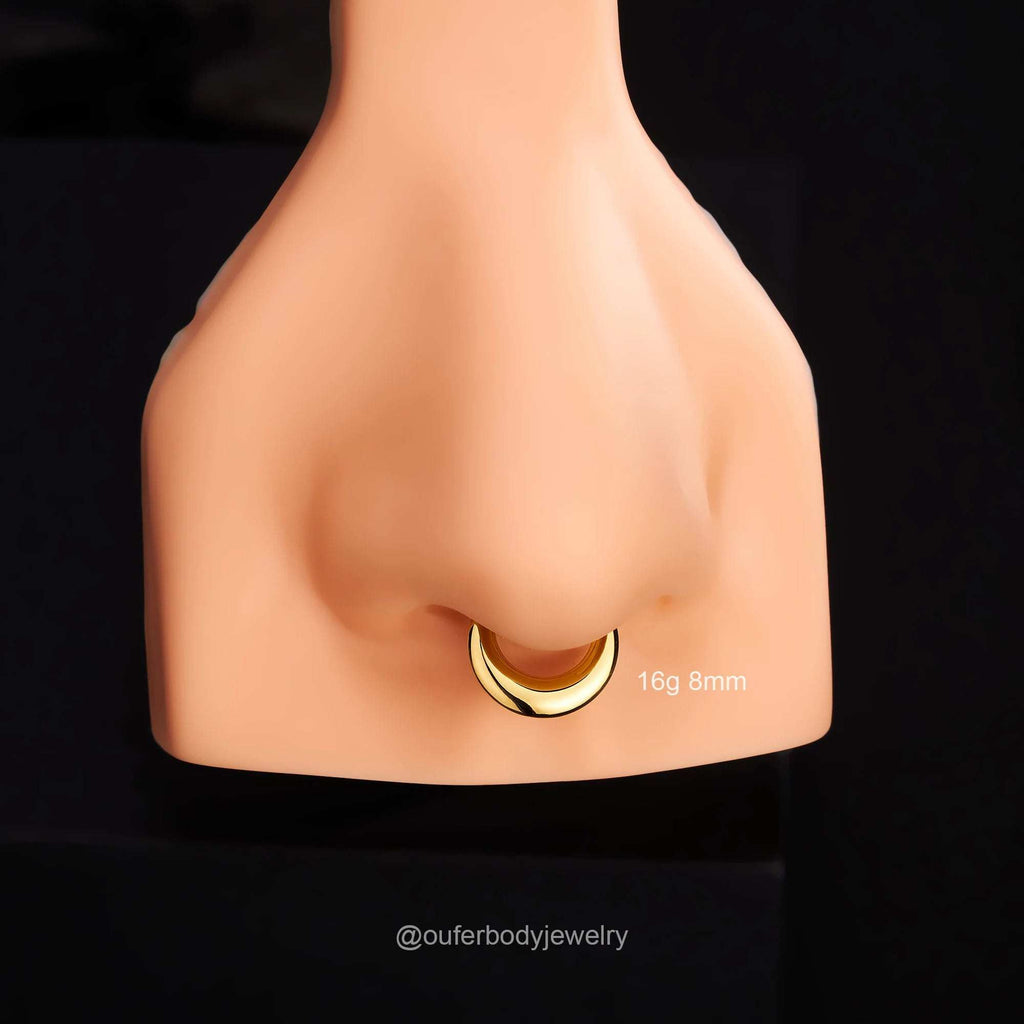 Lunar Bold Septum Clicker – Sculpted Shine for Unapologetic StyleA Statement of Strength, Styled with PrecisionThe Lunar Bold Septum Clicker is the perfect fusion of edgy attitude and refined design. Crafted from premium surgical RemoloxLunar Bold Septum Clicker