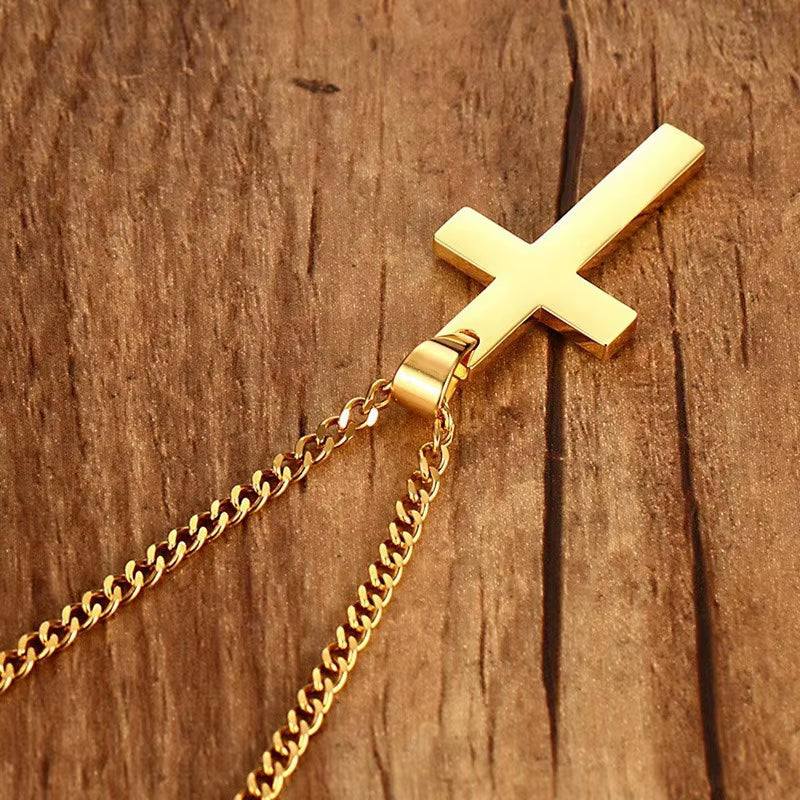 Titanium steel cross necklace with bold pendant layered over sweater for unisex autumn style