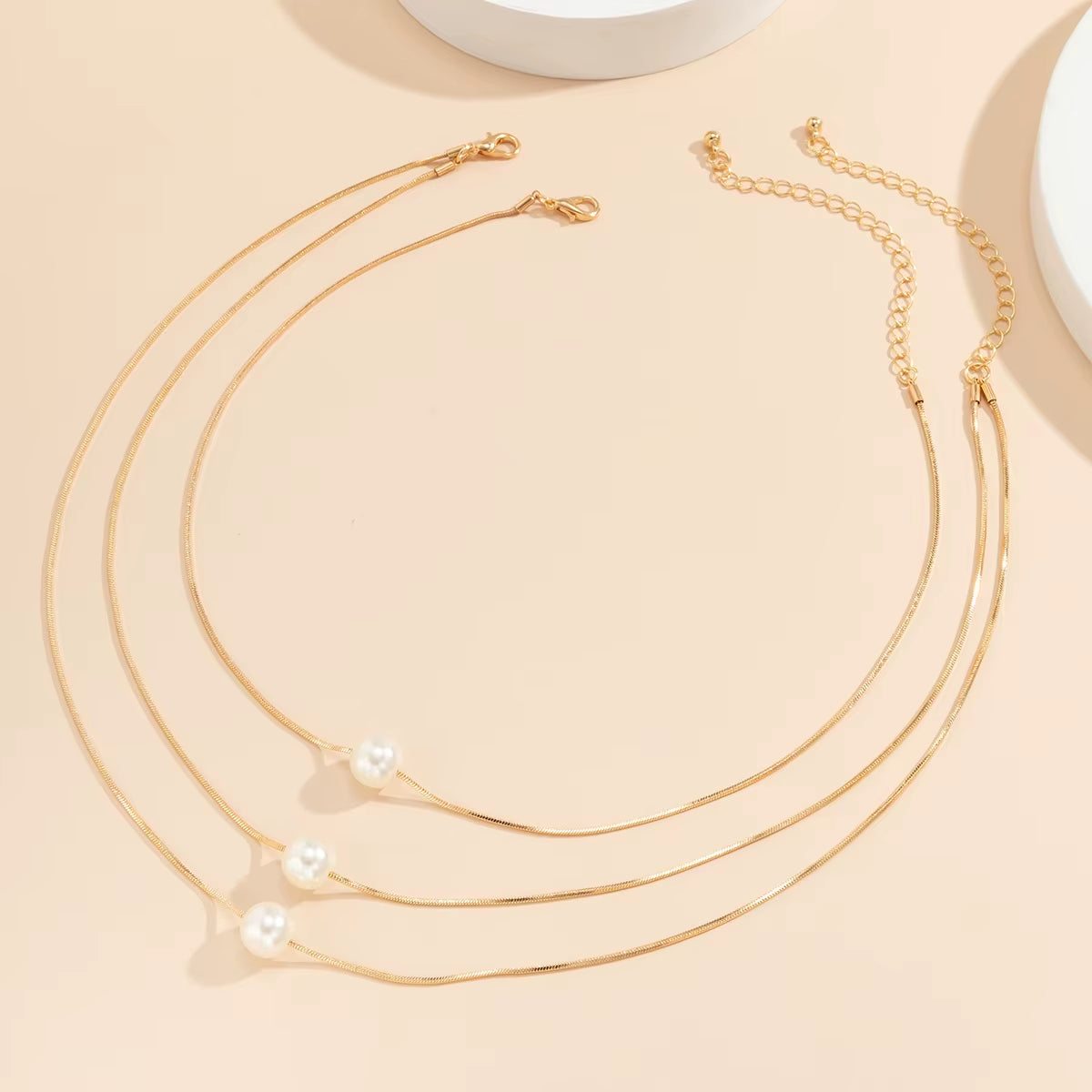 Lunara™ Boho Pearl Clavicle Necklace – Effortless Glow, Timeless GraceWhere Minimalism Meets Modern Boho CharmThe Lunara™ Boho Pearl Clavicle Necklace is a radiant blend of simplicity and sophistication. Featuring a delicate round snakRemoloxLunara™ Boho Pearl Clavicle Necklace