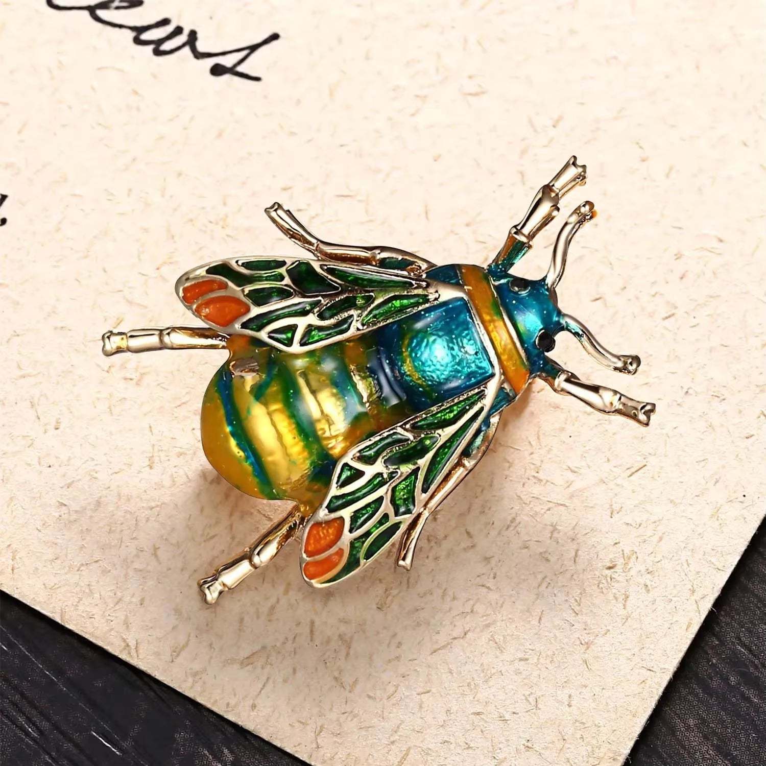 Golden Bee Crystal Brooch with sparkling rhinestones and golden finish, elegant bee-inspired design