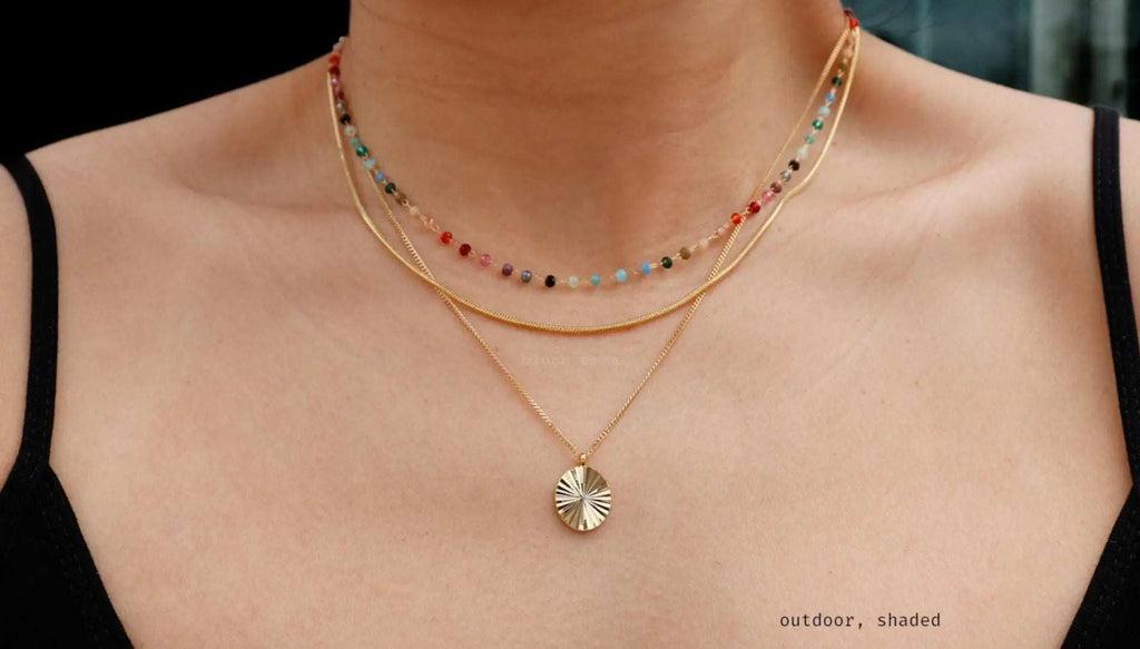Rainbow Gemstone Beaded Necklace – A Dainty Touch of Color and CharmA Splash of Color, A Dash of JoyThe Rainbow Gemstone Beaded Necklace brings a burst of vibrant color and effortless elegance to your collection. Crafted with 1.5mm sRemoloxRainbow Gemstone Beaded Necklace