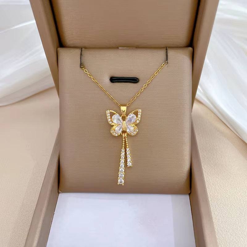 Luna Bloom Butterfly Tassel Necklace – Grace in Every GlimmerA Dance of Light, Elegance, and FantasyDelicate yet bold, the Luna Bloom Butterfly Tassel Necklace is a tribute to femininity, freedom, and the beauty of fine detailRemoloxLuna Bloom Butterfly Tassel Necklace