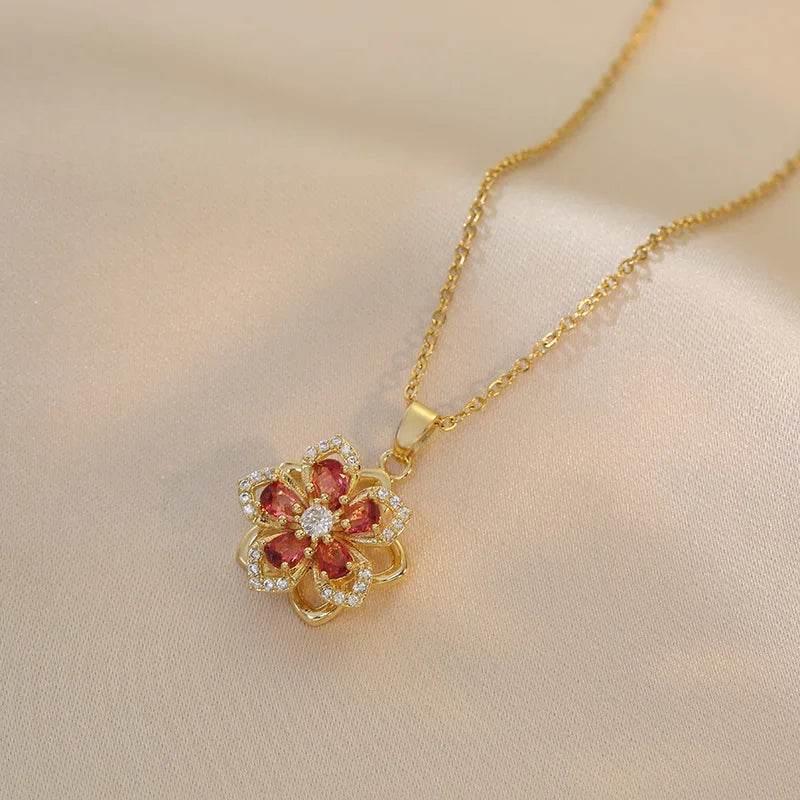 Eternal Bloom Rotatable Flower Necklace – Romance in Every TurnA Flower That Spins with Love and LightUnveil the magic of love and elegance with the Eternal Bloom Rotatable Flower Necklace. Expertly crafted from 316L stainless sRemoloxEternal Bloom Rotatable Flower Necklace