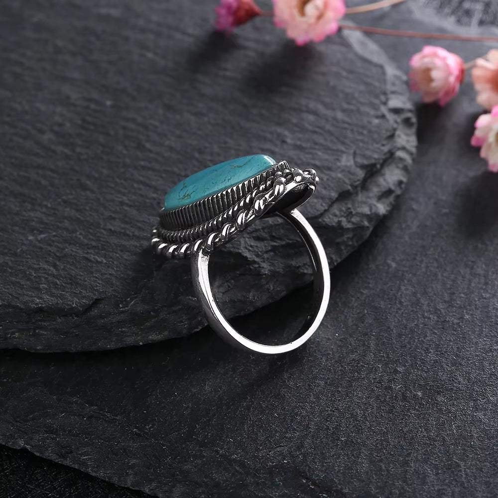 Desert Bloom Turquoise Ring – A Statement of Earthy EleganceWhere Bold Beauty Meets Timeless CraftThe Desert Bloom Turquoise Ring is a celebration of vintage soul and natural luxury. Set in premium 925 sterling silver, the ceRemoloxDesert Bloom Turquoise Ring