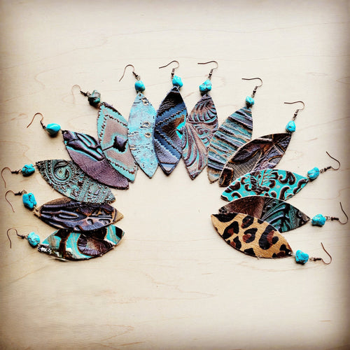 **Boucles d'oreilles ovales en cuir turquoise métallisé avec accent turquoise 207c