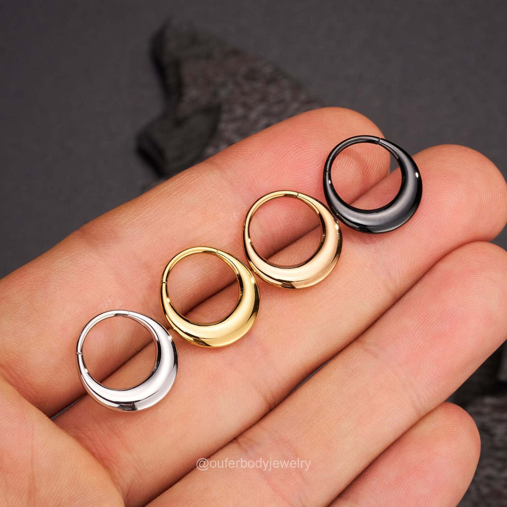 Lunar Bold Septum Clicker – Sculpted Shine for Unapologetic StyleA Statement of Strength, Styled with PrecisionThe Lunar Bold Septum Clicker is the perfect fusion of edgy attitude and refined design. Crafted from premium surgical RemoloxLunar Bold Septum Clicker