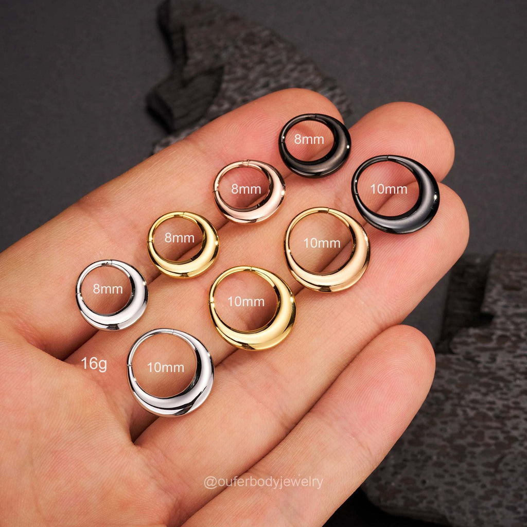 Lunar Bold Septum Clicker – Sculpted Shine for Unapologetic StyleA Statement of Strength, Styled with PrecisionThe Lunar Bold Septum Clicker is the perfect fusion of edgy attitude and refined design. Crafted from premium surgical RemoloxLunar Bold Septum Clicker