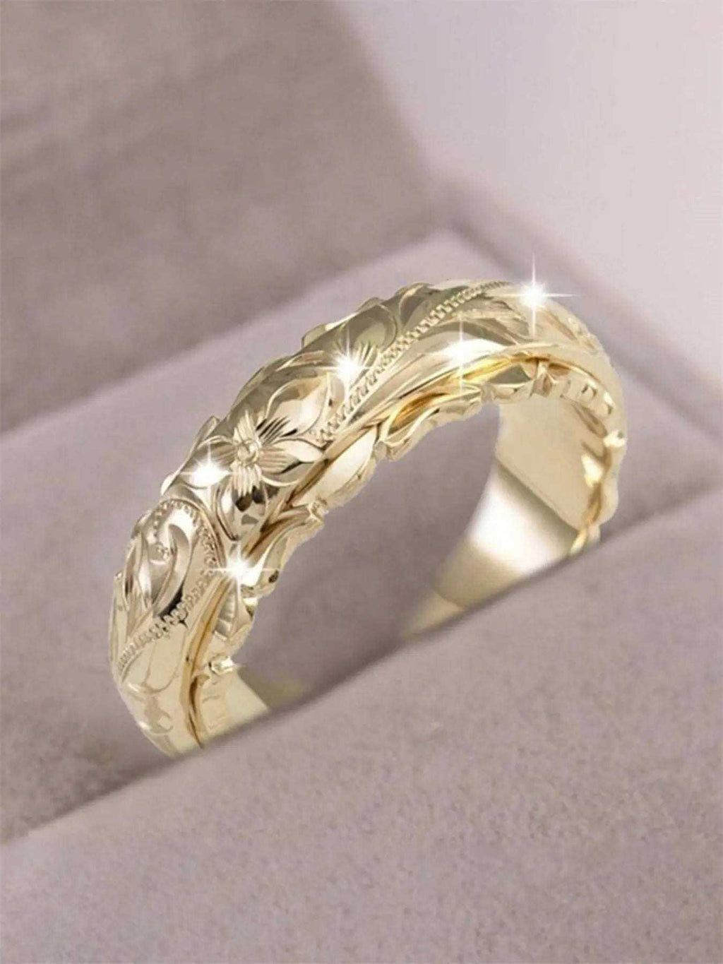 Engraved Flower RingDon’t want to wear a ring that feels ordinary and lacks meaning? This engraved flower ring is here to change that. Thoughtful design with floral engraving, this ringRemoloxEngraved Flower Ring
