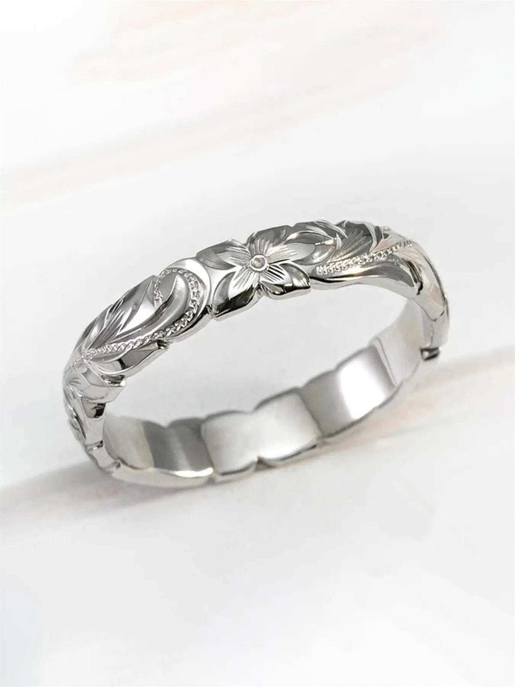 Engraved Flower RingDon’t want to wear a ring that feels ordinary and lacks meaning? This engraved flower ring is here to change that. Thoughtful design with floral engraving, this ringRemoloxEngraved Flower Ring