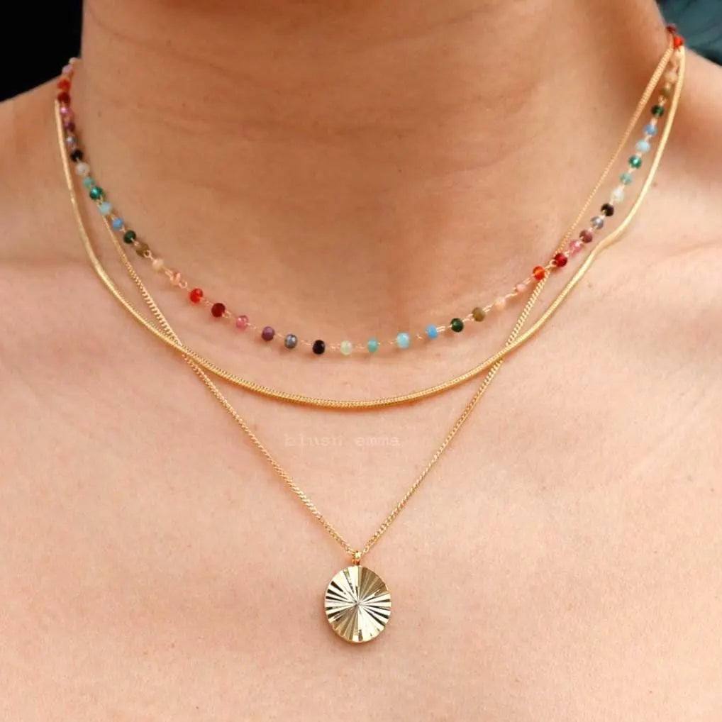 Rainbow Gemstone Beaded Necklace – A Dainty Touch of Color and CharmA Splash of Color, A Dash of JoyThe Rainbow Gemstone Beaded Necklace brings a burst of vibrant color and effortless elegance to your collection. Crafted with 1.5mm sRemoloxRainbow Gemstone Beaded Necklace