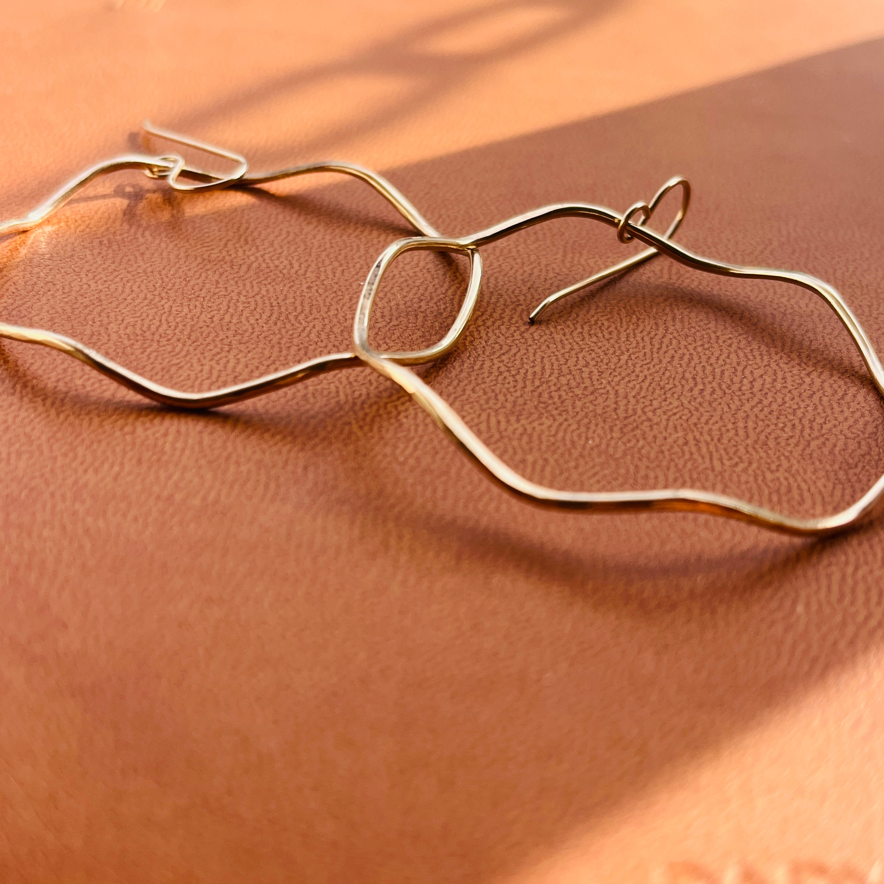 BIG WAVE HOOP EARRINGS