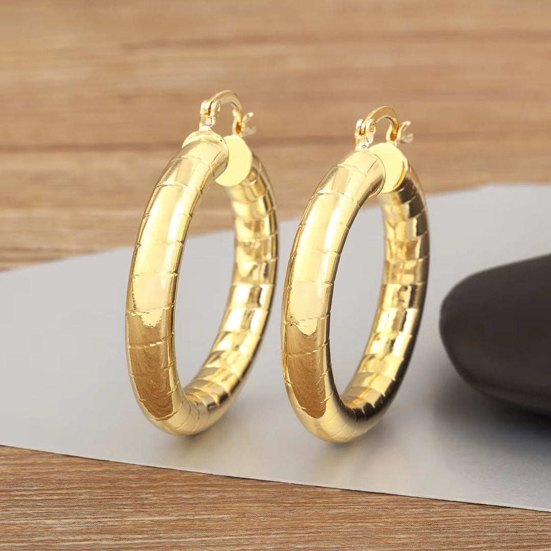 AuraHoop™ Bold Copper Circle Earrings – Four Styles of Effortless ElegClassic Hoops, Modern EdgeThe AuraHoop™ Bold Copper Circle Earrings are the ultimate expression of timeless style with a contemporary twist. Available in four stunniRemoloxAuraHoop™ Bold Copper Circle Earrings