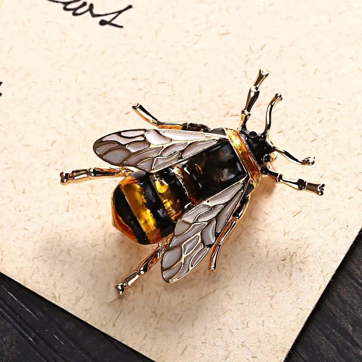 Golden Bee Crystal Brooch featuring sparkling rhinestones and golden finish accessory