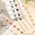 Gold plated Lucky Clover Double-Sided Flower Bracelet on wrist with floral charm design