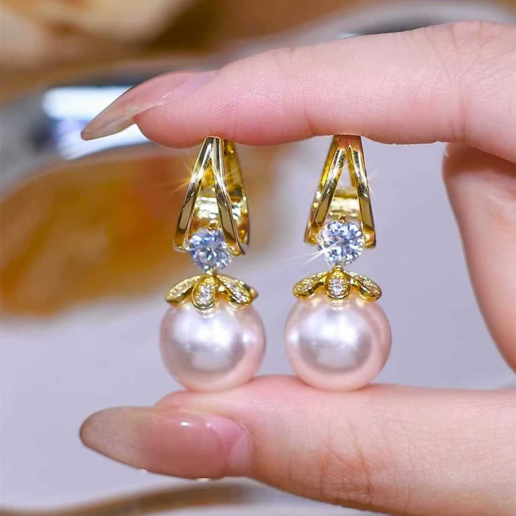 Pearl Earrings Copper Alloy Red Diamond Earrings Fashionable TemperameRadiate Grace with Every TurnThe ScarletLuxe™ Pearl &amp; Red Crystal Drop Earrings are a dazzling expression of classic charm and contemporary sophistication. CraftRemoloxPearl Earrings