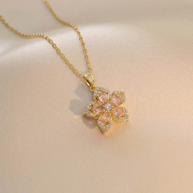 Eternal Bloom Rotatable Flower Necklace – Romance in Every TurnA Flower That Spins with Love and LightUnveil the magic of love and elegance with the Eternal Bloom Rotatable Flower Necklace. Expertly crafted from 316L stainless sRemoloxEternal Bloom Rotatable Flower Necklace
