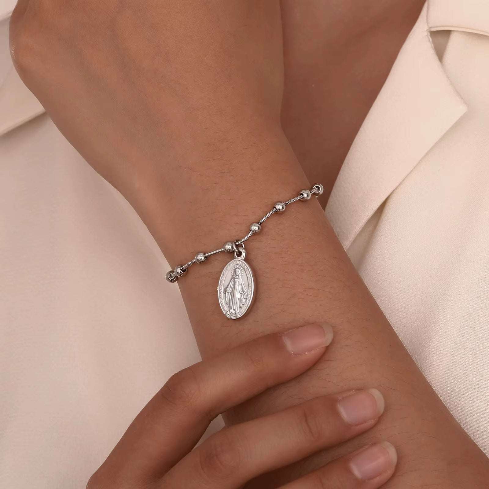 Divine Grace Rosary Bracelet – Faith Woven in Golden BeautyA Sacred Symbol, Elegantly WornThe Divine Grace Rosary Bracelet is a delicate fusion of devotion and style, thoughtfully designed for women and girls who carry theirRemoloxDivine Grace Rosary Bracelet