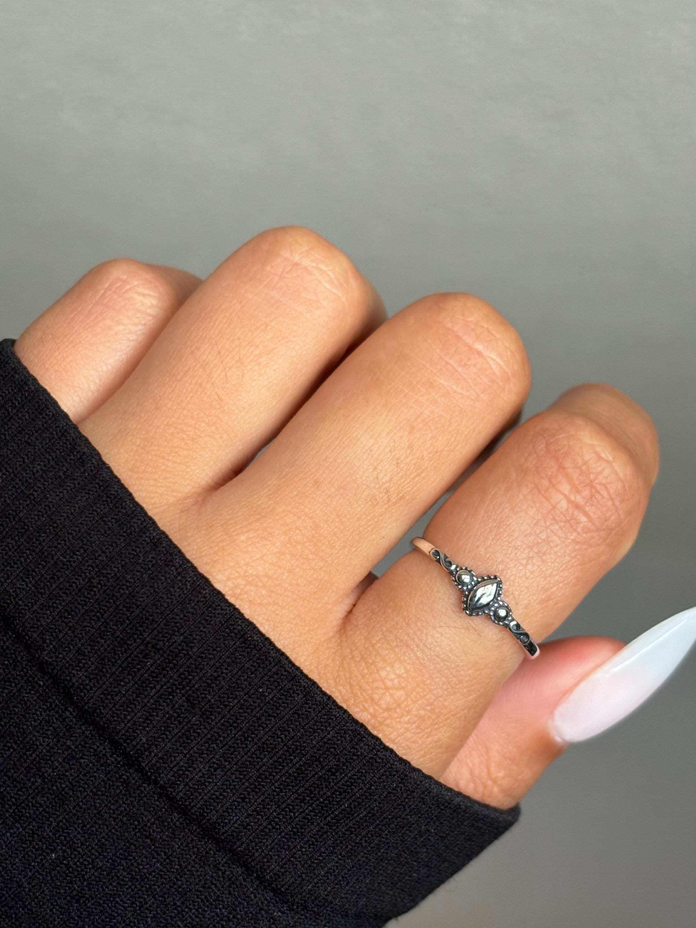 Whisper of Bali Dainty Silver Ring – Timeless Simplicity with Island SA Minimalist Touch Inspired by Exotic EleganceThe Whisper of Bali Dainty Silver Ring captures the quiet charm of island artistry with a sleek, modern twist. Crafted RemoloxWhisper of Bali Dainty Silver Ring