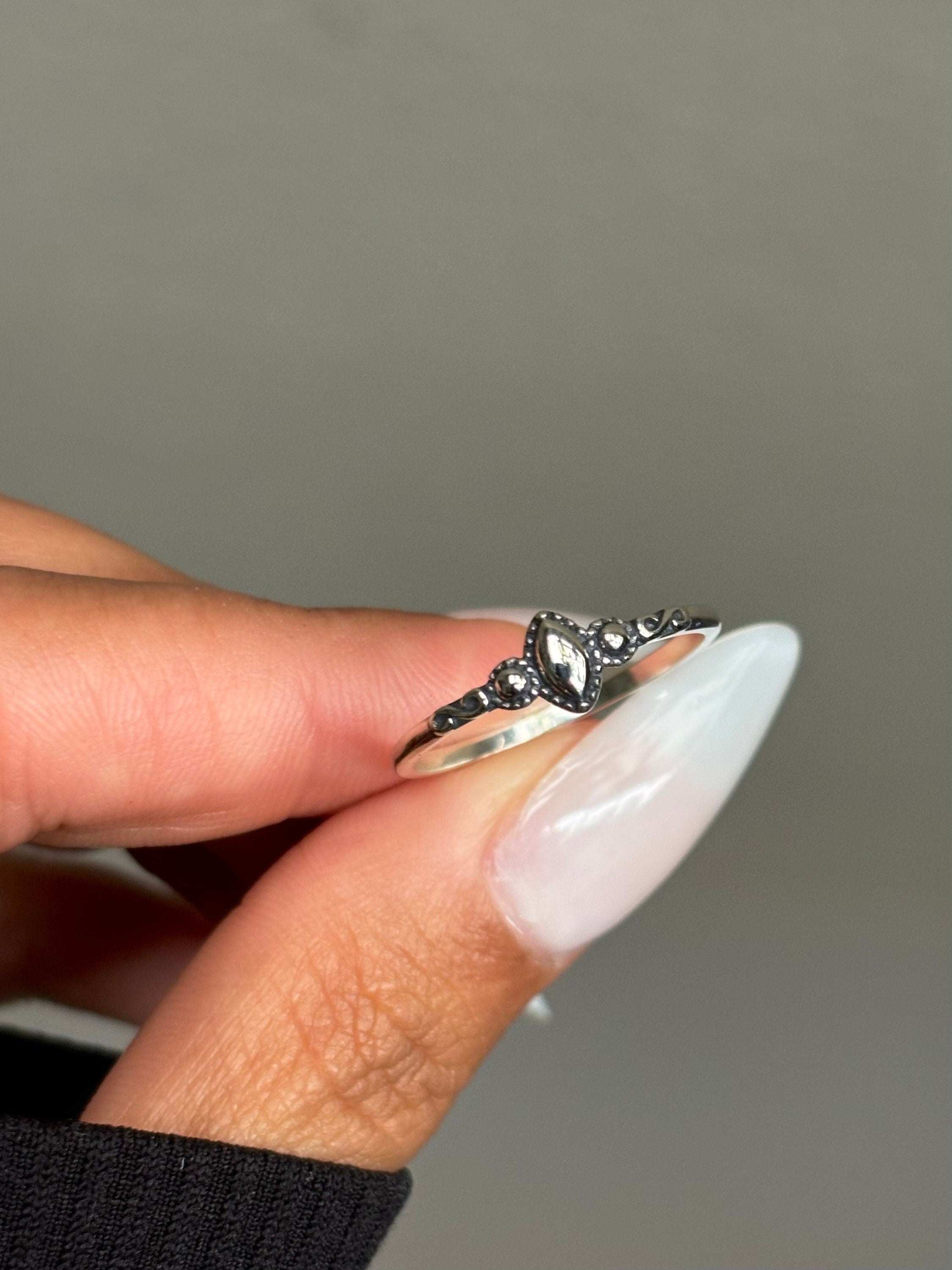 Whisper of Bali Dainty Silver Ring – Timeless Simplicity with Island SA Minimalist Touch Inspired by Exotic EleganceThe Whisper of Bali Dainty Silver Ring captures the quiet charm of island artistry with a sleek, modern twist. Crafted RemoloxWhisper of Bali Dainty Silver Ring