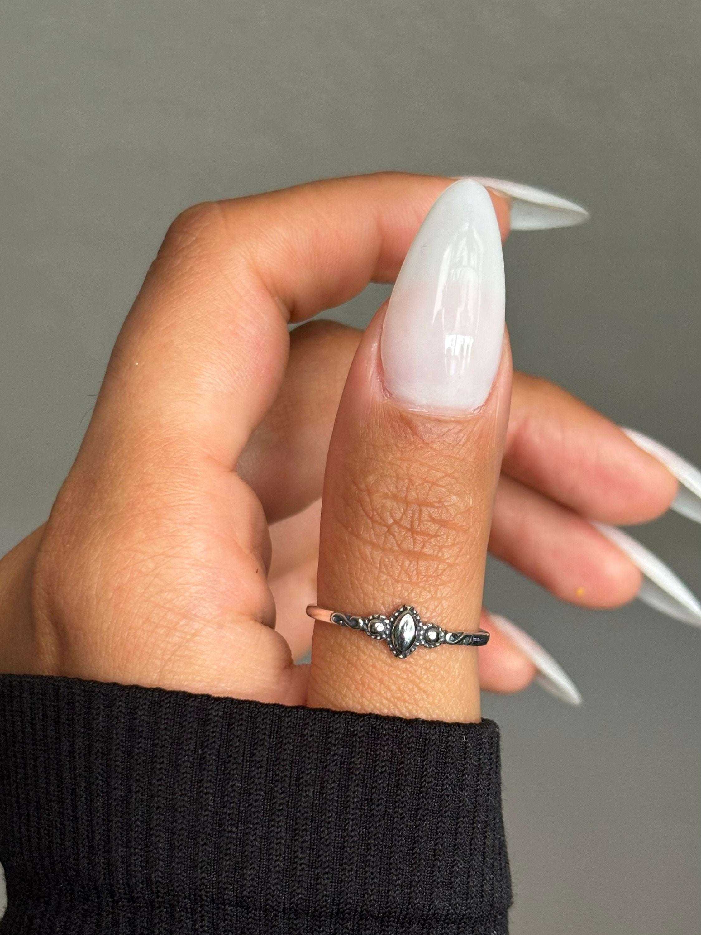 Whisper of Bali Dainty Silver Ring – Timeless Simplicity with Island SA Minimalist Touch Inspired by Exotic EleganceThe Whisper of Bali Dainty Silver Ring captures the quiet charm of island artistry with a sleek, modern twist. Crafted RemoloxWhisper of Bali Dainty Silver Ring