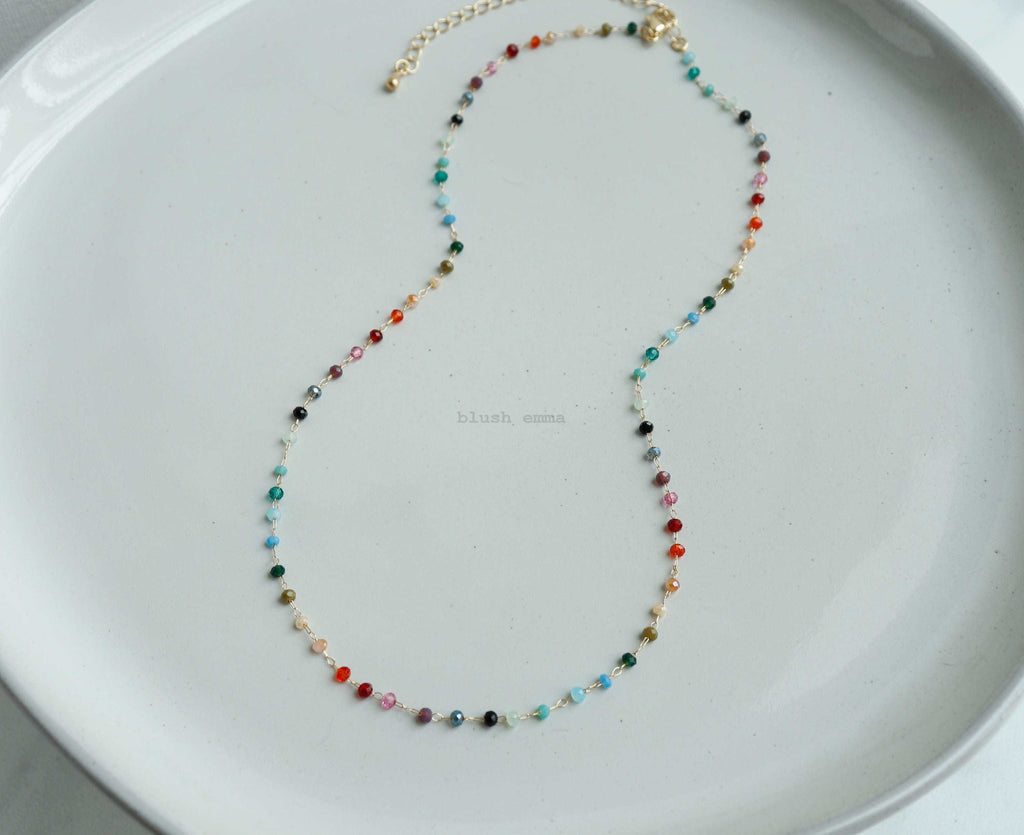 Rainbow Gemstone Beaded Necklace – A Dainty Touch of Color and CharmA Splash of Color, A Dash of JoyThe Rainbow Gemstone Beaded Necklace brings a burst of vibrant color and effortless elegance to your collection. Crafted with 1.5mm sRemoloxRainbow Gemstone Beaded Necklace