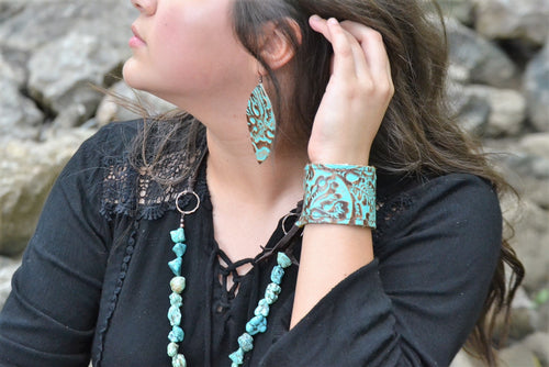 **Boucles d'oreilles ovales en cuir turquoise de cowboy 203a