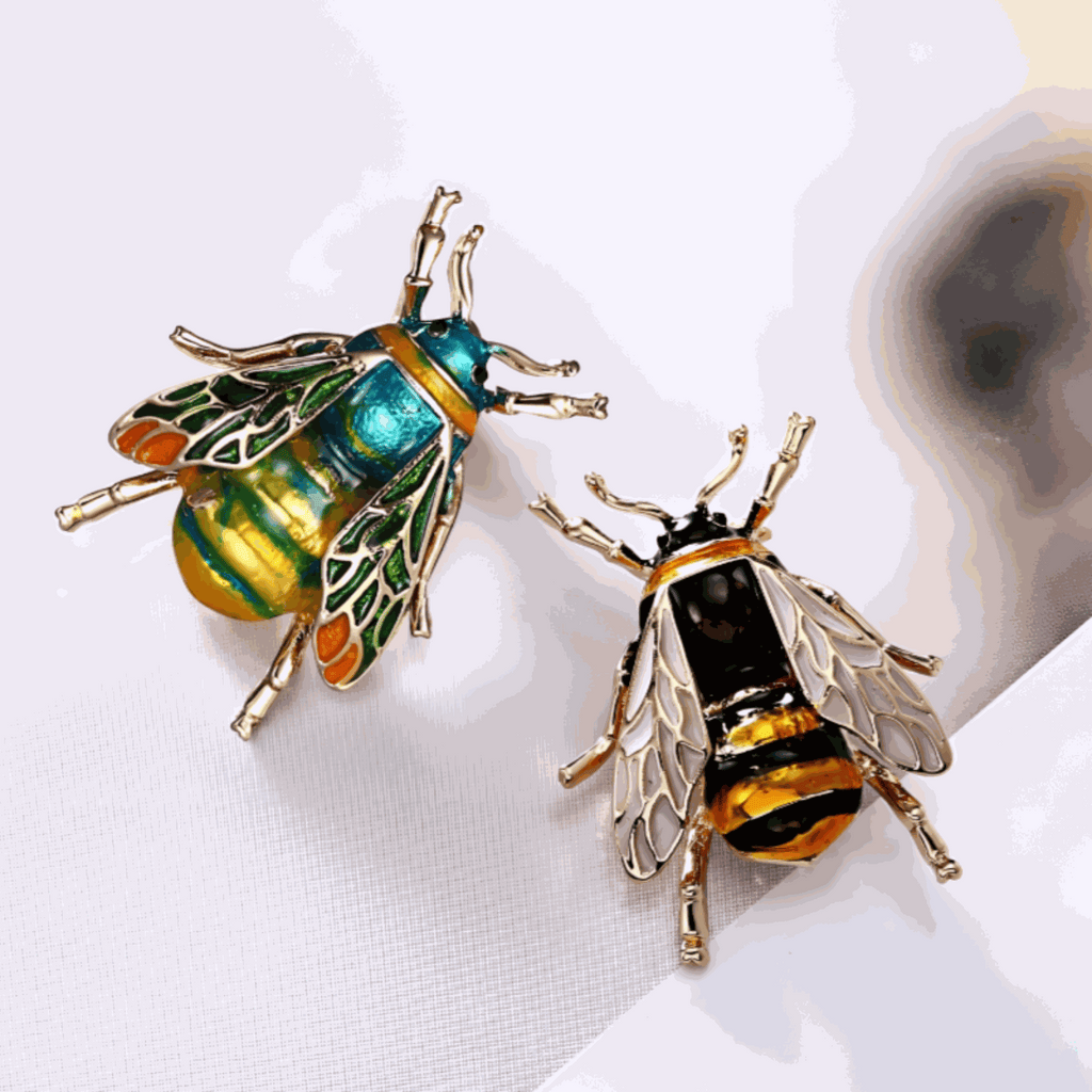 Golden Bee Crystal Brooch with sparkling rhinestones and golden finish on a white background