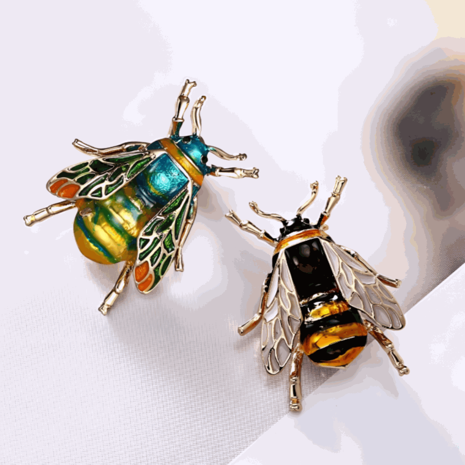 Golden Bee Crystal Brooch with sparkling rhinestones and golden finish on a white background